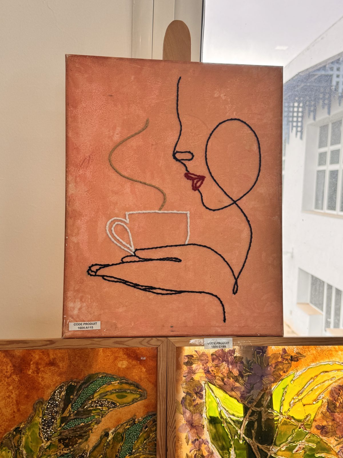 Toile « Visage au café »