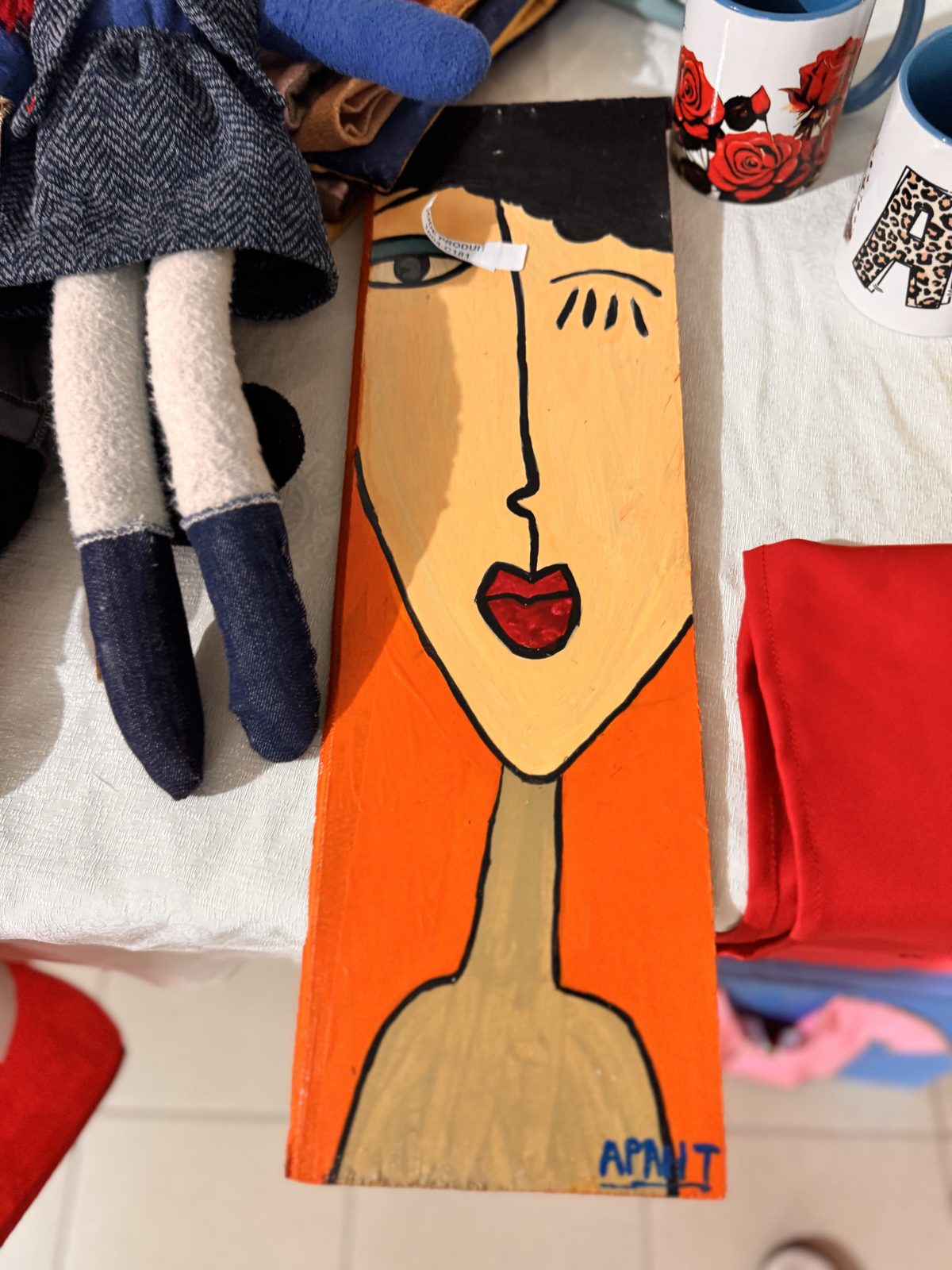 Tableau sur bois peint « Visage stylisé »